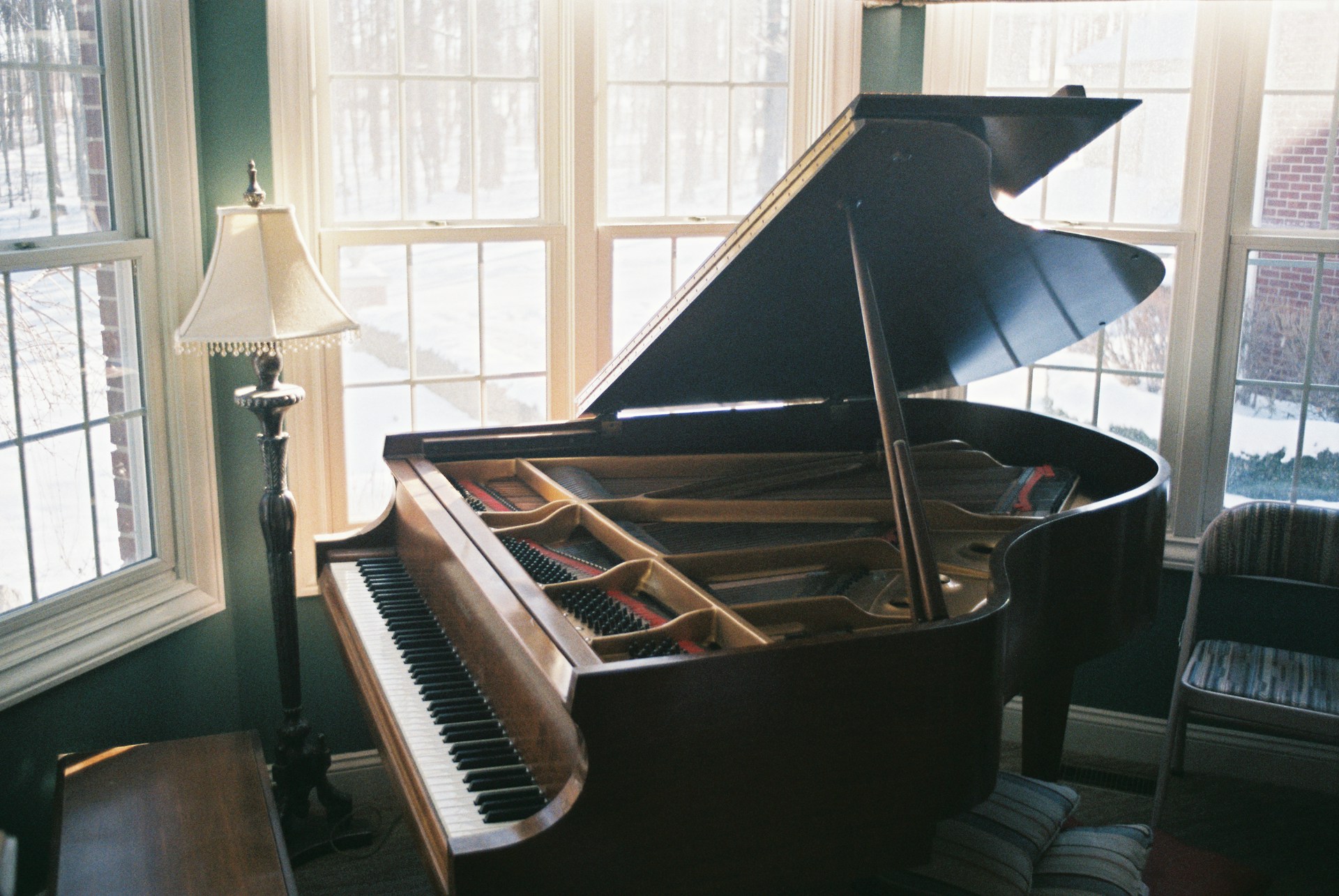 Grand piano in a sunlit music room